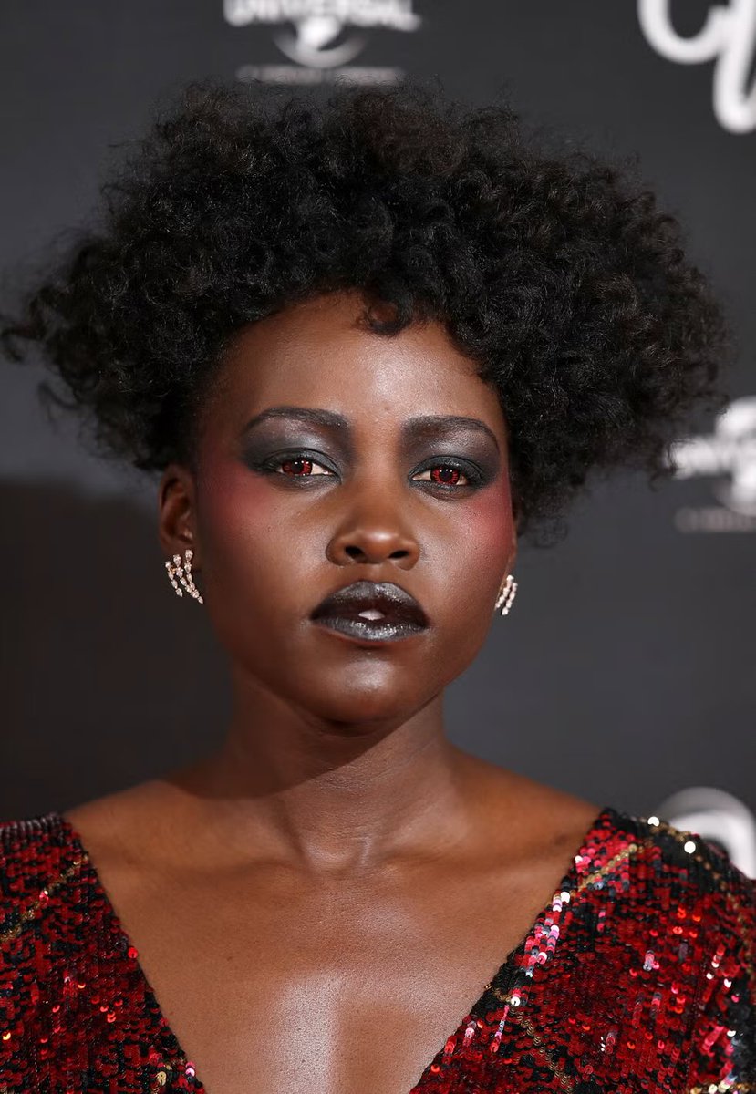 the world moved on but i’m still thinking about lupita nyong’o wearing red contacts to the premiere of us. she would play an amazing vampire.