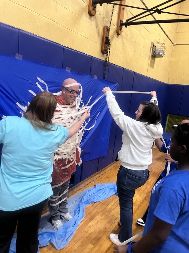 SCSchools's tweet photo. Every Day Matters at Yates! 🎒
To celebrate the Yates Attendance Challenge, winning classes earned the "sticky" honor of taping Principal Sloan to the wall—and the top three even delivered a pie to his face! 🥧
Showing up is the first step to success. #projectbehere https://t.co/nVnla4aom5