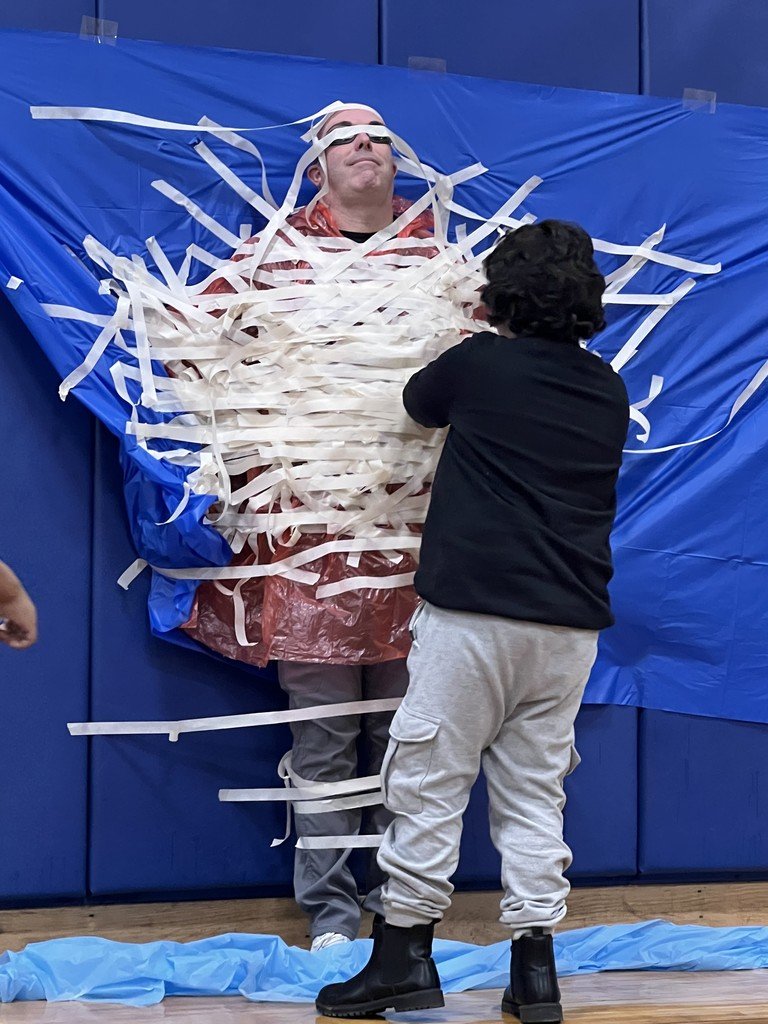 SCSchools's tweet photo. Every Day Matters at Yates! 🎒
To celebrate the Yates Attendance Challenge, winning classes earned the "sticky" honor of taping Principal Sloan to the wall—and the top three even delivered a pie to his face! 🥧
Showing up is the first step to success. #projectbehere https://t.co/nVnla4aom5