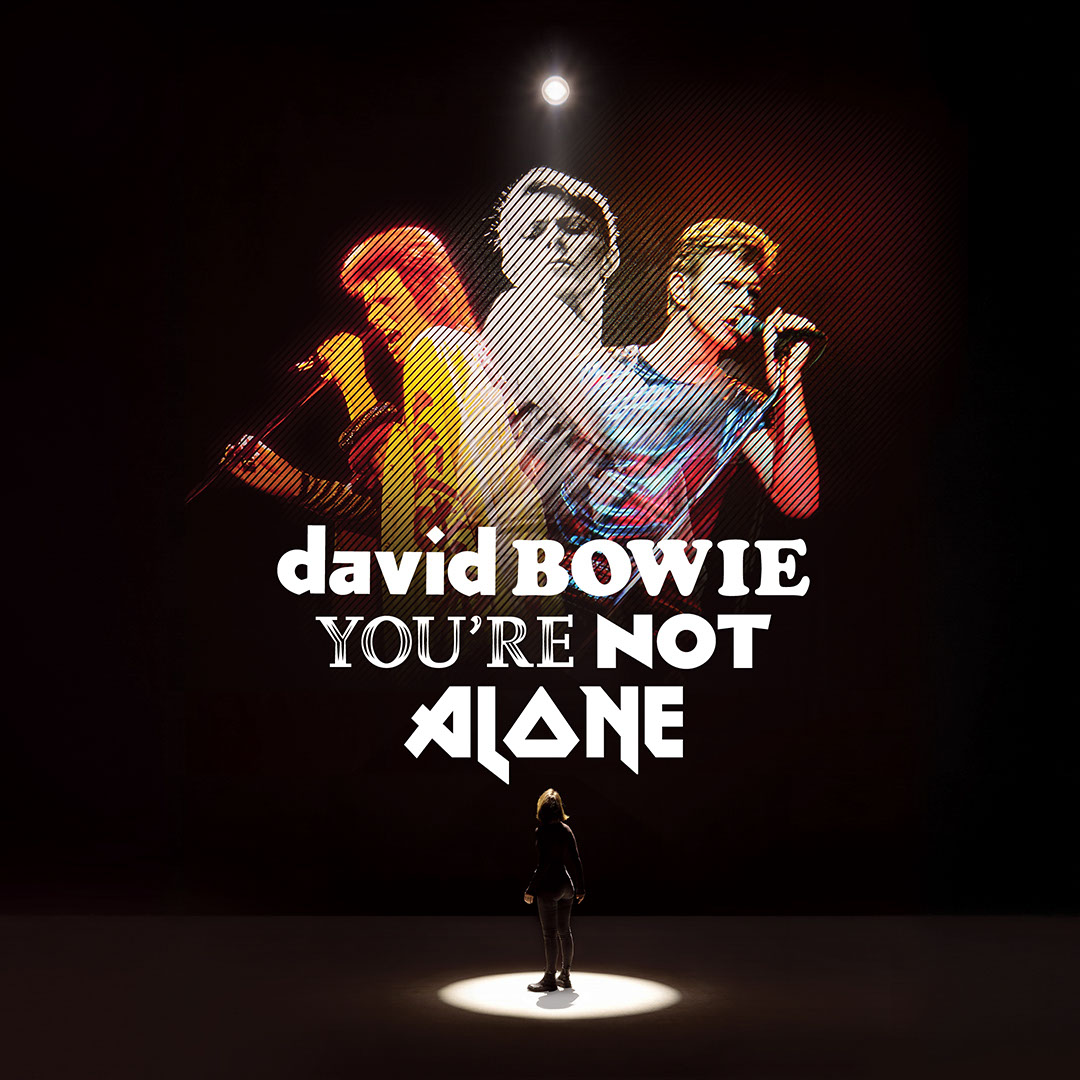 DavidBowieReal's tweet photo. DAVID BOWIE: YOU’RE NOT ALONE

“Just turn on with me...”

Today Lightroom announces a groundbreaking show, David Bowie: You’re Not Alone, which will transport visitors into the iconic performances and creative mind and spirit of one of the world's most visionary and influential artists.

Featuring the artist as its sole voice, David Bowie: You’re Not Alone is both a multimedia spectacle and an intimate and revealing self-portrait.

Keep reading for more details, tickets here: https://t.co/gXCkQU3rMz

#BowieLightroomLDN #BowieYoureNotAlone #DavidBowie

DAVID BOWIE: YOU’RE NOT ALONE
LIGHTROOM UNVEILS MAJOR NEW SHOW OPENING IN APRIL
COMING 22 APRIL 2026 | LIGHTROOM | LONDON KING’S CROSS N1C
[London, Tuesday 10 February 2026] Today Lightroom announces a groundbreaking show, David Bowie: You’re Not Alone, which will transport visitors into the iconic performances and creative mind and spirit of one of the world's most visionary and influential artists.
Featuring the artist as its sole voice, David Bowie: You’re Not Alone is both a multimedia spectacle and an intimate and revealing self-portrait.

The 360° experience, produced by Lightroom and designed by 59, a Journey studio, is written and directed by 59’s Mark Grimmer (Creative Director for the V&A’s David Bowie Is exhibition) and Tom Wexler. You’re Not Alone will showcase some of Bowie’s landmark performances that redefined popular culture, using a mixture of iconic, rarely seen and never-before-exhibited material, selected from thousands of hours of film in the vaults of the David Bowie Archive in New York, from Space Oddity through Diamond Dogs and ”Heroes” to ★. Audiences will have the chance to feel they have travelled through time to experience Bowie in performance - up close and first-hand. Each track in the show has been newly reconfigured to utilise Lightroom's specialised spatial audio system by multiple Olivier and Tony award-winning sound designer Gareth Fry (Harry Potter & The Cursed Child, David Bowie Is).

This is David Bowie, the man himself. Instead of magnifying the myth through the lens of his characters - Ziggy Stardust, Aladdin Sane, Halloween Jack, The Thin White Duke - You’re Not Alone places its focus on the man behind the masks: the provocateur, the polymath, the shapeshifting icon in his enduring, human form.

The film is structured in thematic chapters in a looping presentation, giving a unique insight into Bowie's perspective on the subjects most important to him, including: theatricality, spirituality, songwriting and the transformative power of creativity. There are surreal moments, like the transatlantic TV interview with Russell Harty in 1975, in which Bowie artfully takes control of the narrative and the interviewer is reduced to asking him questions about the colour of his hair. Elsewhere, the reconstructed set of the inimitable Diamond Dogs tour materialises before our very eyes, igniting a Bowie performance unlike any other captured on film.

Bringing together a wealth of visual material from a wide range of sources, the show combines rare performance footage, photography, drawings, lyrics, personal notes and audio recordings. David Bowie: You're Not Alone will celebrate Bowie's boundless curiosity as a force that connected people across continents and generations, as well as his enduring cultural impact today.

The show builds on Lightroom’s growing repertoire of critically acclaimed shows that have now been seen by over 1.5 million visitors globally, including creative collaborations with David Hockney, Tom Hanks, Anna Wintour and Vogue and Apple TV.

David Bowie: You're Not Alone is being made in close collaboration with and authorized by the David Bowie Estate.
Mark Grimmer, who also wrote and directed Lightroom’s David Hockney: Bigger & Closer (not smaller and further away) said:

"It says something about our relationship with artistic heroes that we're drawn to mystery, otherness, the alien... In Bowie's case, this is our construct, not his. Throughout his career, Bowie repeatedly resisted being figured as anything but human. Rather than undermining his mystique, we designed a show to celebrate Bowie as a champion of human creativity - focusing on the message he expressed time and again: that art, in all its forms, is our best hope for understanding what it means to be alive."

David Sabel, Executive Producer at Lightroom said:

“Lightroom offers an incredible opportunity to step inside an artist’s imagination and creative universe – weaving film, photography, animation, text and music into a story that can only be experienced in this space. I cannot think of an artist more suited to this than David Bowie. To spend time in his world as it comes to life around you and to travel back and forth across the decades of astonishing performances, whether reliving them or experiencing them for the first time, is a total thrill. Working so closely with RZO and the David Bowie Archive has been a great privilege.”

Tickets for David Bowie: You're Not Alone will go on sale on 10 February at 7pm, priced from £25 for adults and £15 for students and concessions: https://t.co/gXCkQU3rMz

Tickets will be available from 22 April until 28 June, with more tickets being released for summer soon. To be the first to hear about the next ticket release sign up to Lightroom’s mailing list here. https://t.co/n1ZQ97ToiW

Go here for the full press release: https://t.co/Sd4GRuwcHK