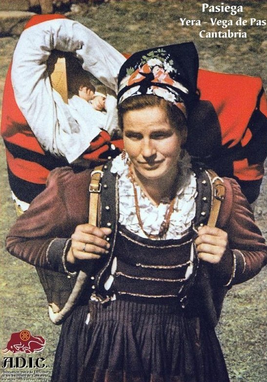 A Spanish mother carrying her child.