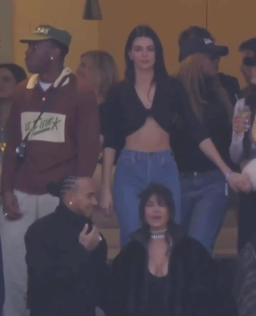 LimitedBnm's tweet photo. This is actually wild to me. Kendall Jenner is standing behind her ex (Lewis Hamilton), who’s now dating her older sister, while dancing to her other ex’s live performance (Bad Bunny), who just accepted the 2026 Grammy Award for Album of the Year from her other ex (Harry Styles) https://t.co/pXw2CSfEJX