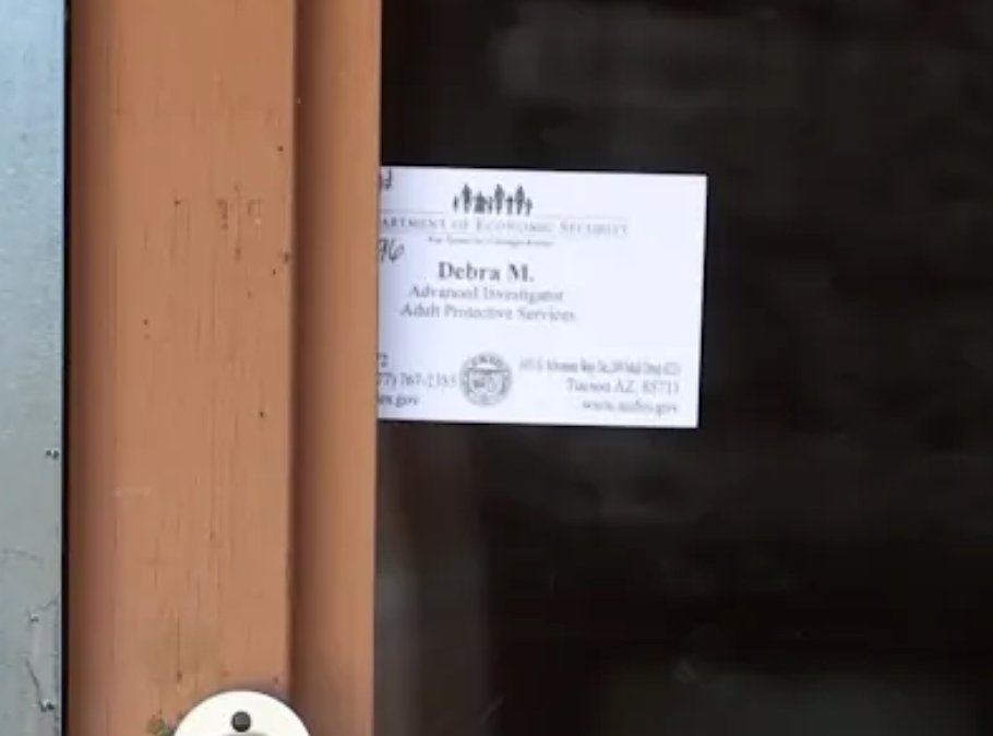 This is a card from an investigator from Adult Protective Services that was left on Nancy Guthrie's front door. Its safe to say this was left before the crime because this picture was taken in the first day or two and APS would not visit while there was a crime scene and the