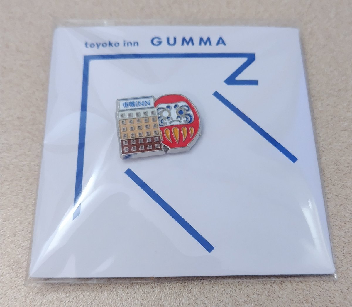 うちの子が東横イン御当地ピンバッジを集めてるので購入。群馬はだるま。