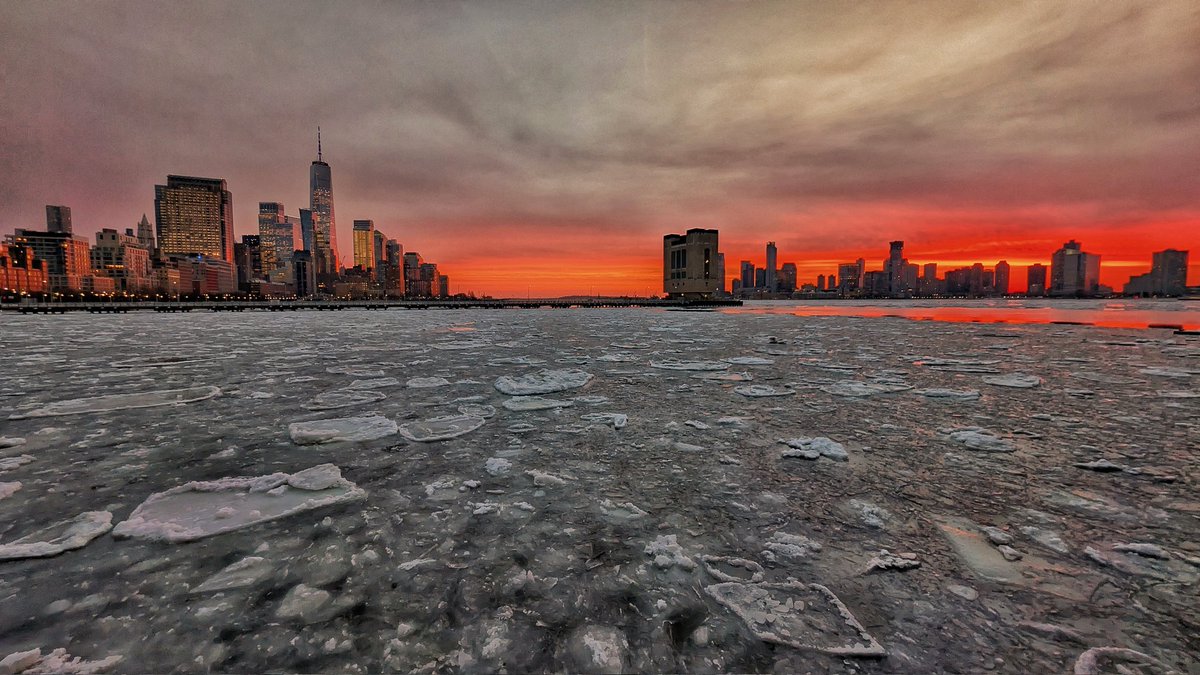 An ice filled Hudson River as the sun sets behind lower Manhattan and Jersey City, New Jersey, Tuesday evening #newyork #newyorkcity #nyc #sunset