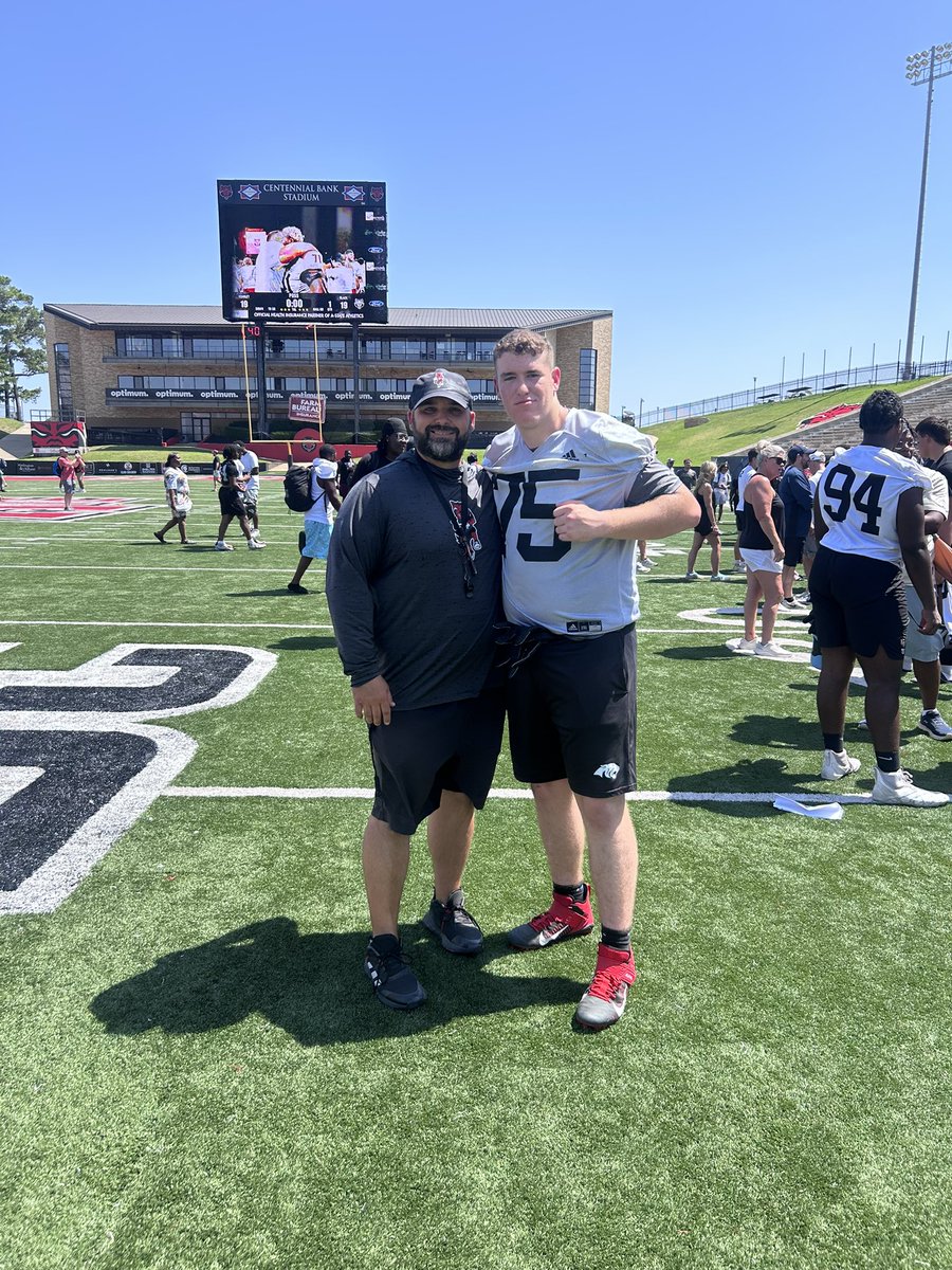 PoeBrady74's tweet photo. Very grateful for the invite to the @AStateFB Pack Day and Spring Game! Excited to see the offseason work pay off on the field. Also thankful to be invited back to the A-State Big Man Camp — looking forward to working with @CoachNickGrimes and @TylerMontgomer1 this summer! 💪
#WolvesUp🐺 
@CoachButchJones @AStateFB_Rec @CabotFB @LanceClark3 @hunterjackson51 @CoachGibson96 @PrepRedzoneAR @youareathlete @sixstarfootball @CSAPrepStar