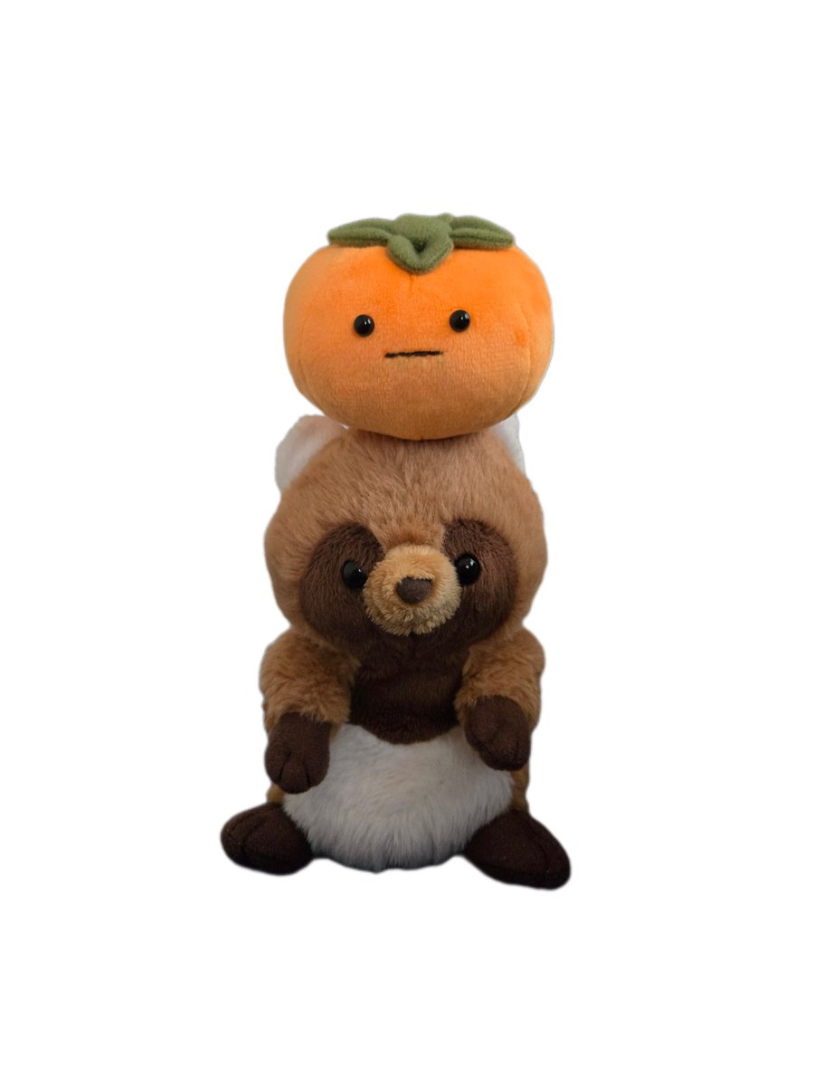 タヌキのぬいぐるみの友達を探していたところ、ポキータさんの柿を見て