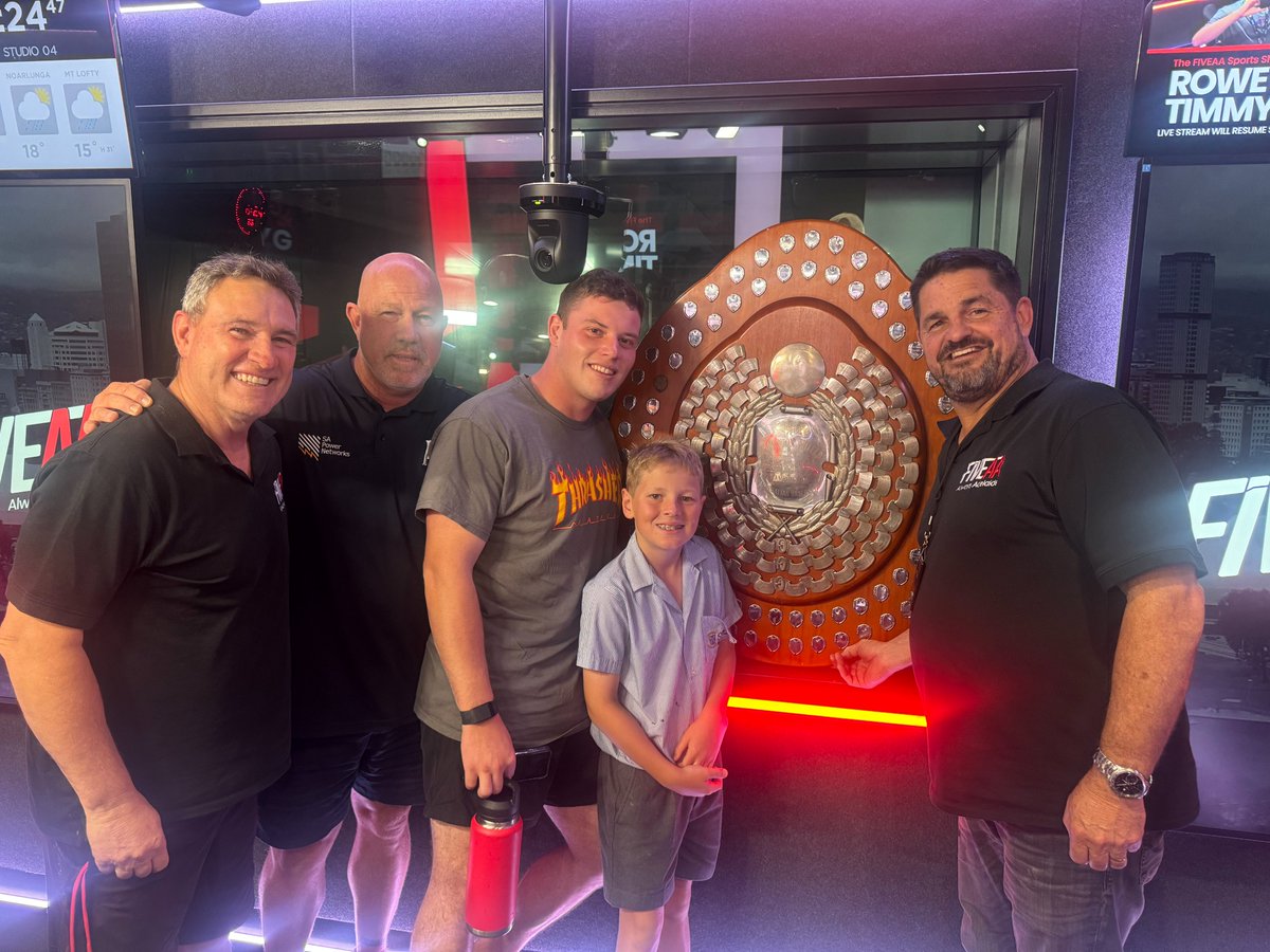 RoweyandTimmyG's tweet photo. Our thanks to @AdelaideGiants GM, Nathan Davison and Catcher, Mitch Edwards, for bringing the Claxton Shield into the studio.

The Giants successfully won their third Championship in four years, after ending a 43-year drought in the 2022-23 season. https://t.co/eibiVSl7UC