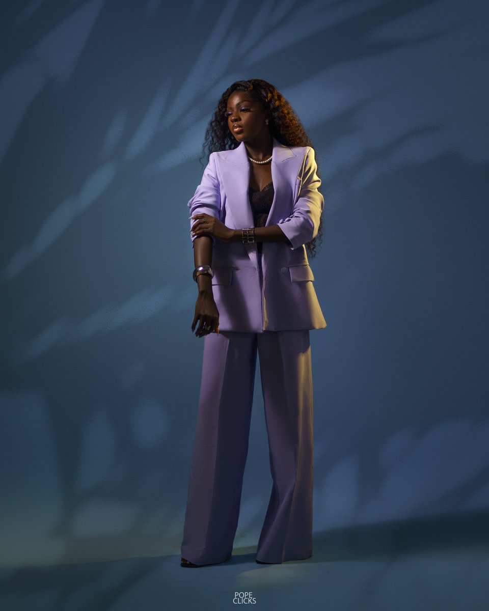 I photographed Odunayo for the second time. 
We went for blue and green last year, we chose blue this year.