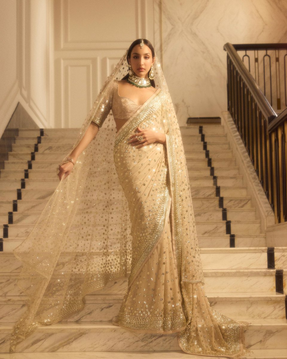 MMalhotraworld's tweet photo. Like scattered starlight illustrated into form, an infinity of our signature golden sequins awaken across the surface of our #INAYA summer bridal ensembles. @ManishMalhotra https://t.co/bOeDGyv1di