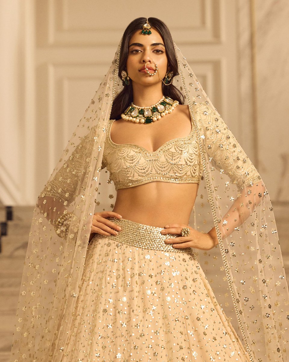 MMalhotraworld's tweet photo. Like scattered starlight illustrated into form, an infinity of our signature golden sequins awaken across the surface of our #INAYA summer bridal ensembles. @ManishMalhotra https://t.co/bOeDGyv1di