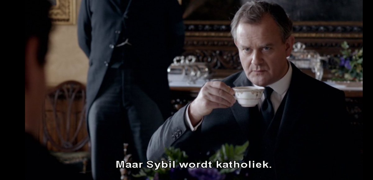 Katholiek? Dat nooit! Lord Grantham van Downton Abbey is pijnlijk verrast als hij hoort dat zijn kleindochter katholiek zal worden gedoopt. Ik moest denken aan Joan Lindhouts boek joanlindhout.com/dat-nooit/ Overigens is scenarioschrijver Julian Fellowes zelf van katholieke adel.