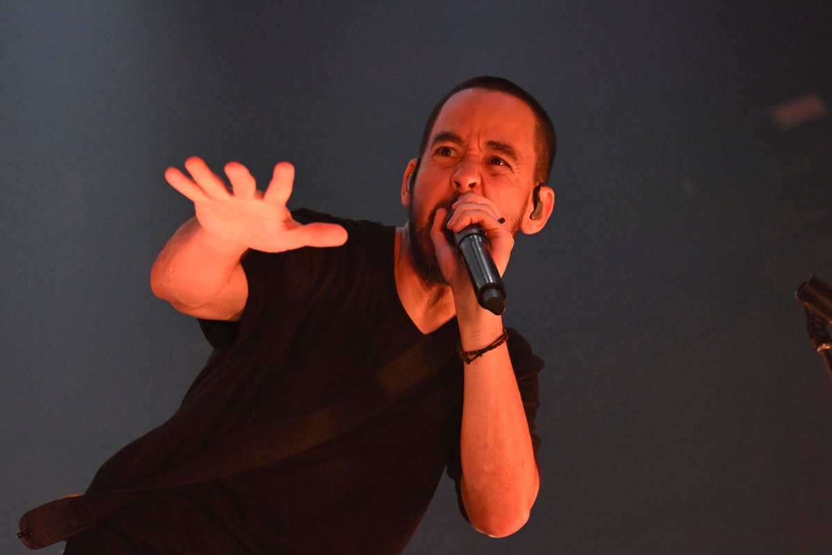 Loudwire's tweet image. On Mike Shinoda's birthday, we want to know what Linkin Park song you think best display's Mike's flow:

📸: Timothy Norris, Getty Images