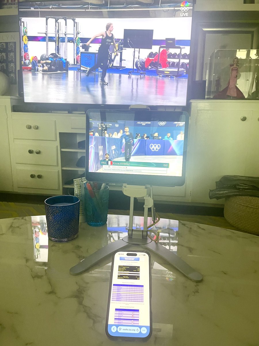 NVerreos's tweet photo. We’re not in Milan but…here’s our “set-up” for watching Olympics Figure Skating ⛸️🙌🏽📺🤳💻 #werecommitted @milanocortina26 @Olympics https://t.co/wkHvpvy6Fy