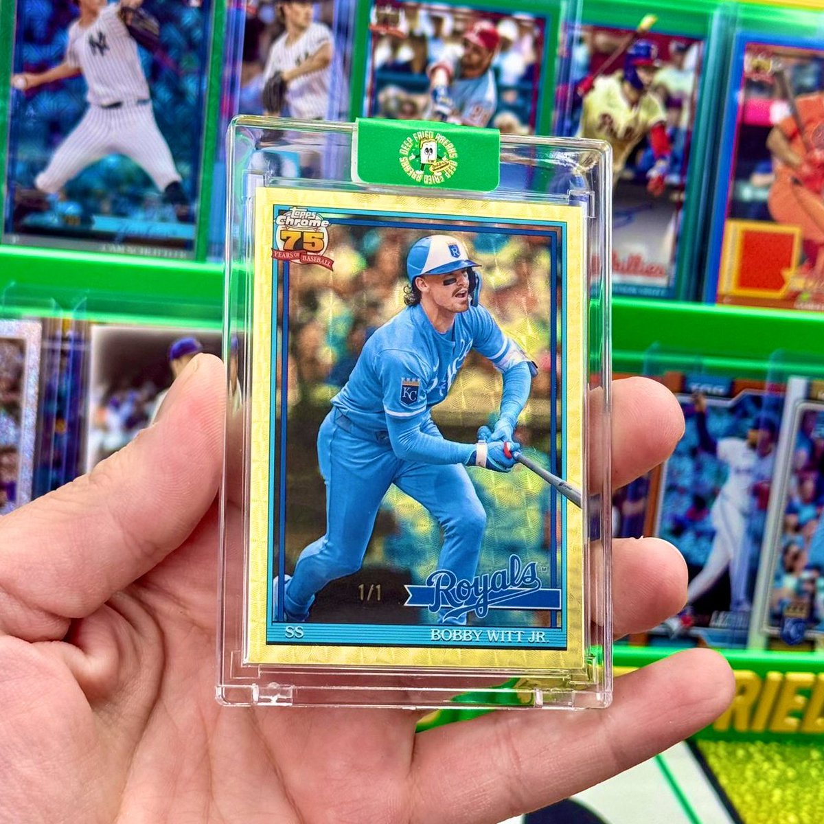 Topps's tweet image. JUST PULLED: 1-of-1 Bobby Witt Jr. was found inside a box of 2026 Series 1.

What a beauty.