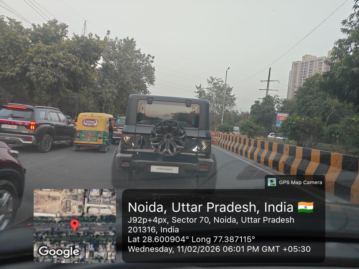Hey <a href="/uptrafficpolice/">UP Traffic Police</a> <a href="/noidapolice/">POLICE COMMISSIONERATE GAUTAM BUDDH NAGAR</a> <a href="/Noidatraffic/">Noida Traffic Police</a>! 🚨 Check out this vehicle with modified tyres sticking out and that number plate! This is a clear violation, and I'm totally requesting a challan to be issued! Please share the action taken! 😠🛣️ #TrafficSafety