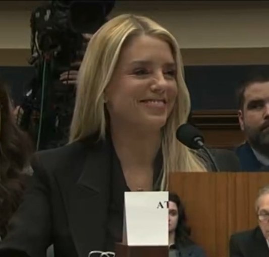Pam Bondi had the nerve to make this face after refusing to apologise or even LOOK at the victims she has ignored and gaslit.