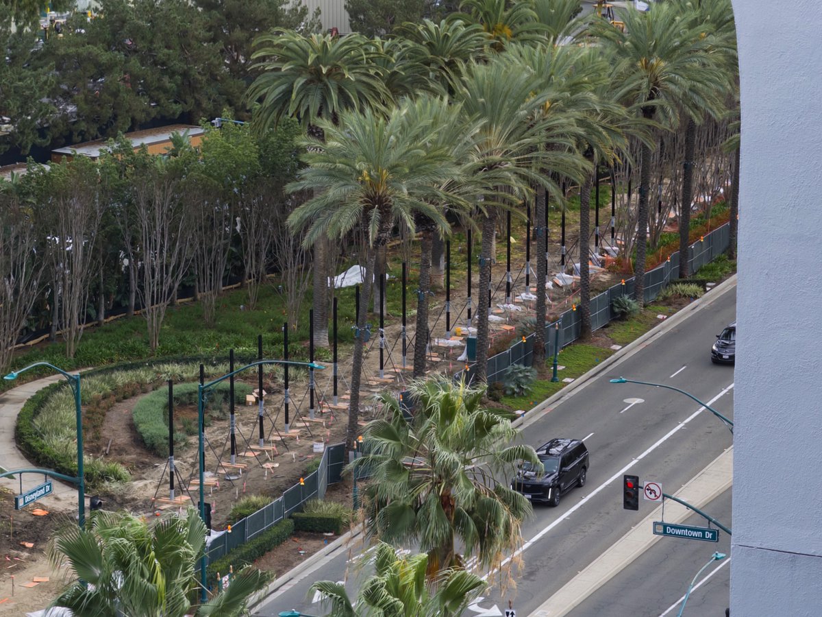 Fascinating update at the work site behind Pixar Pier. Posts have been erected, likely for a fence. 

My guess is this will be the new DCA perimeter fence that will allow for construction to begin on the Coco attraction.