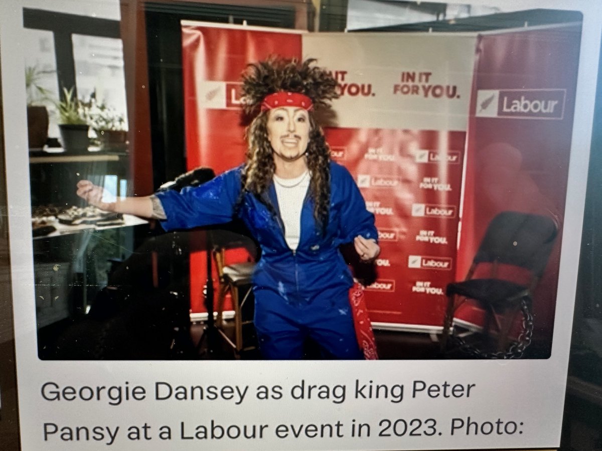 PsPeterMortlock's tweet photo. What the H----!

NZ Labour’s political party latest list MP — queer drag performer Georgie Dansey (drag name Peter Pansy). Here she/he is performing at a Labour event in 2023 — now on the list!

Is this normal New Zealand?
What is wrong with this country?
What the heck!
God forgive us!

Family First have a great clip (everyone needs to watch): “Is Labour Dragging Us into 2027”
https://t.co/yAYozCjqgq

Thanks, Bob.