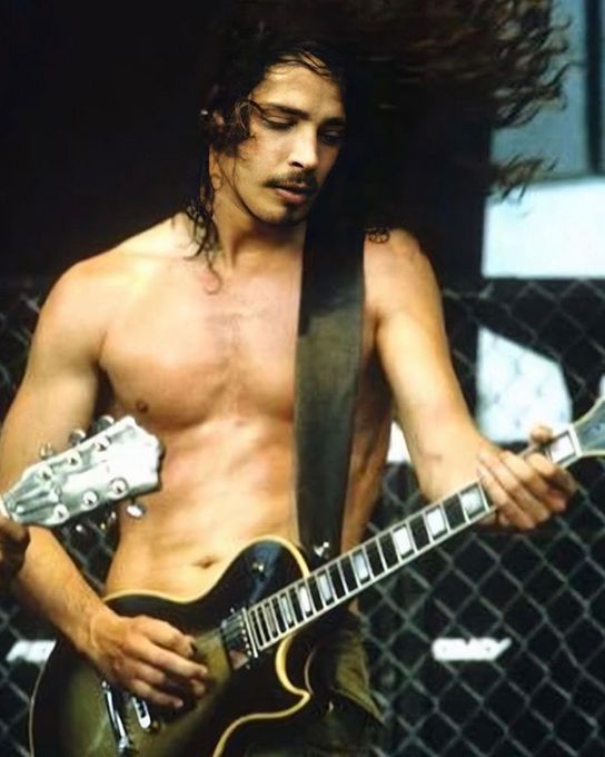 Chris Cornell during Lollapalooza, summer 1992. Photo by Henry Diltz. Soundgarden was touring in support of Badmotorfinger at the time. Did you ever attend Lollapalooza?