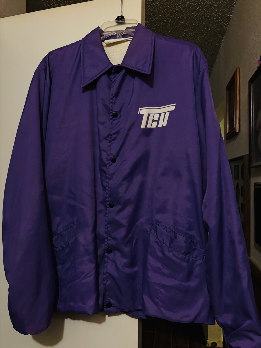 damay1959's tweet photo. Pulled this from the back of the closet. I have had this 40 years but haven’t worn it in a while. Like new still. The liner, the snaps. I used to wear it a lot because during the 80s in San Antonio it was the only TCU jacket I had. Pretty cool to have IMO. #TCU #FlyingT #GoFrogs https://t.co/ClYuPgG8Al