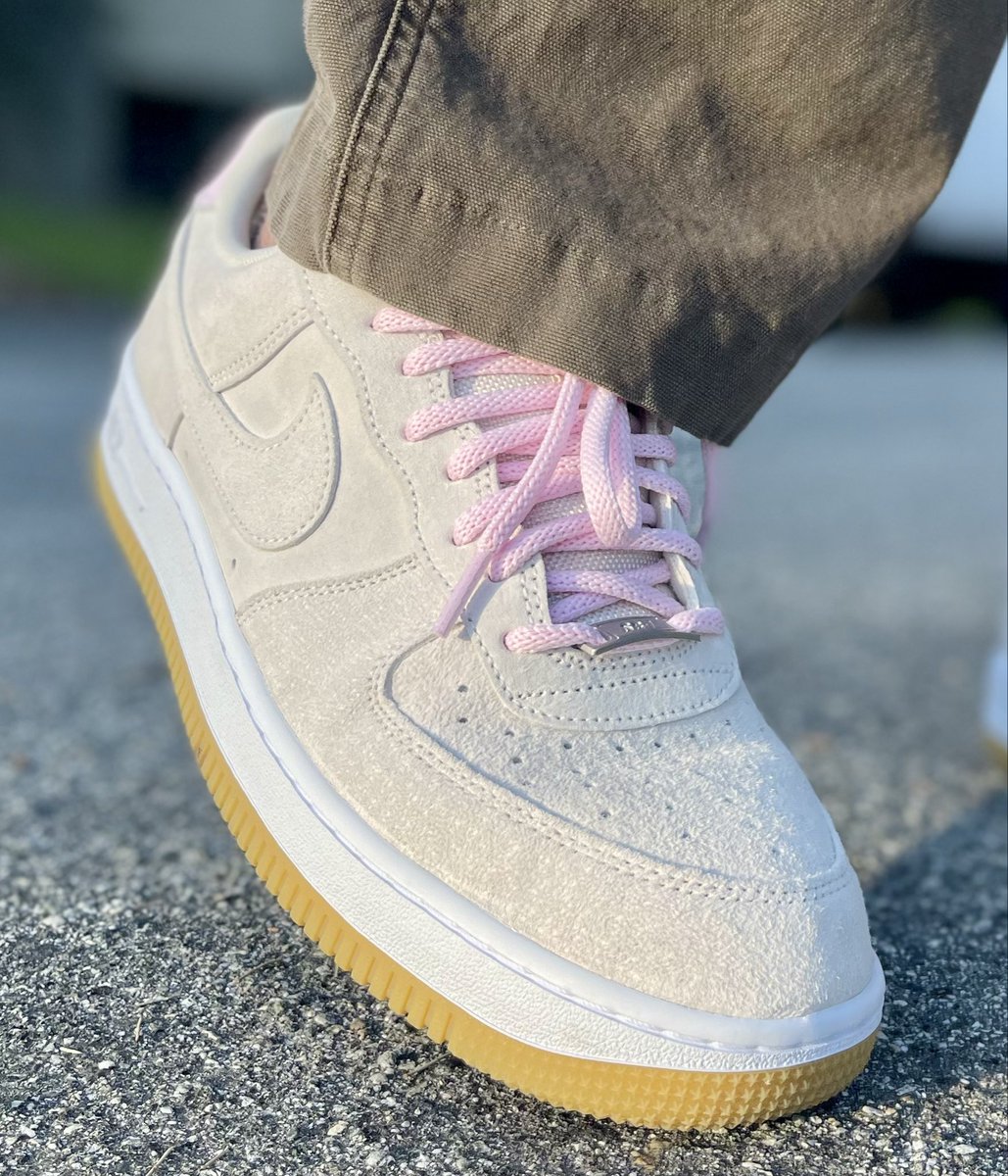 brown nikes with pink laces