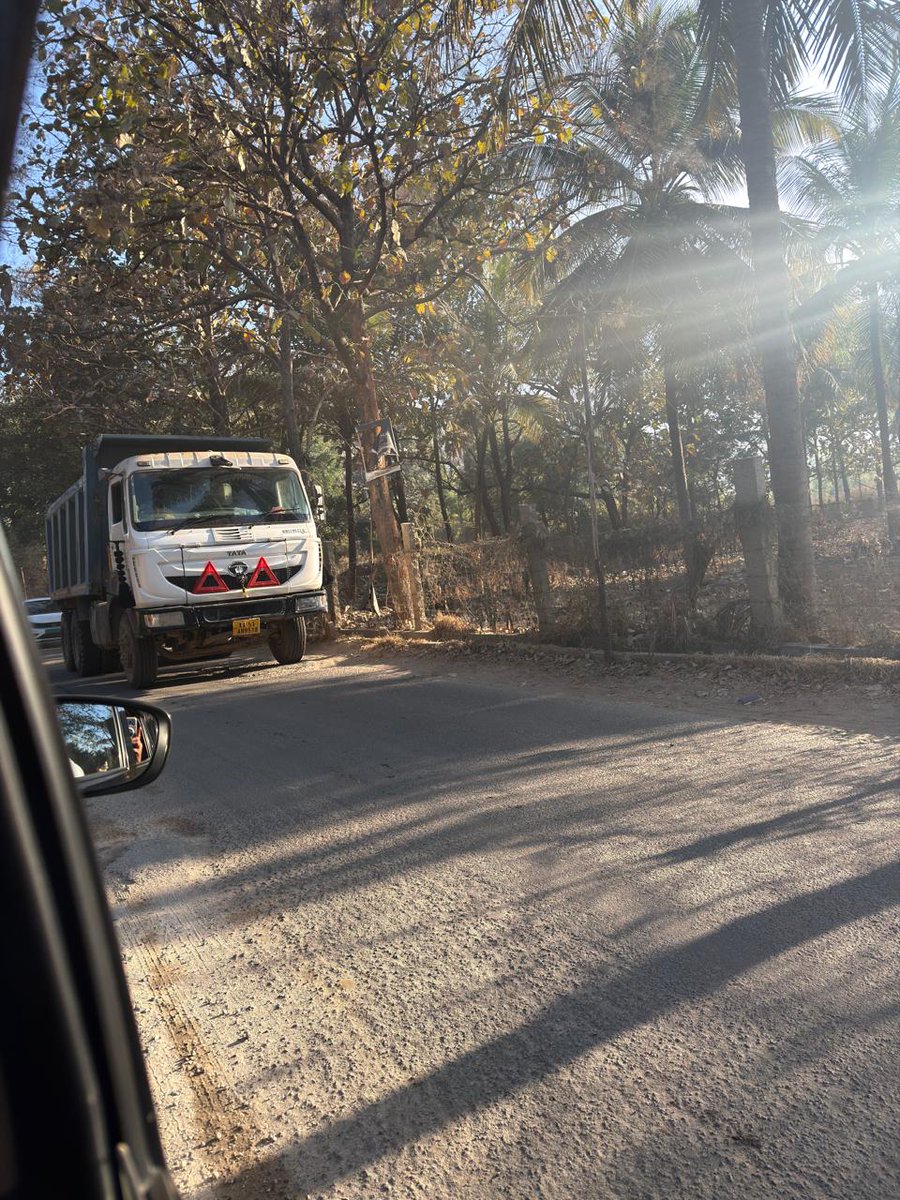 RoopaSrini96705's tweet photo. Reputed schools. Heavy duty trucks. Thousands of children. 
And THIS is the road condition? Craters instead of roads, dust everywhere &amp; zero maintenance.
Who is responsible? Govt closing eyes as usual. Please act before disaster! Sad state of chikkanayakanalli road! https://t.co/eVBwr8qCV8