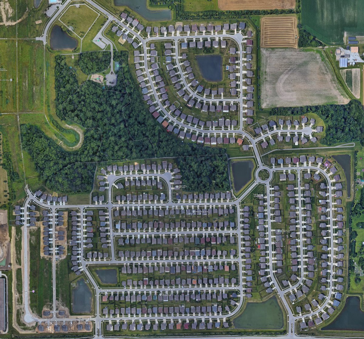 PropagandaPD's tweet photo. 🚨🇺🇸 TRUCKING INDUSTRY FRAUD EXPOSED!
On the left is a random suburb outside of Indianapolis.
If you had to guess, how many trucking companies do you think are in this photo?
10? 30? 90?

How about 250? 
America is drowning in fraud. 

SOURCE: @supertrucker https://t.co/aRUMqclOmA