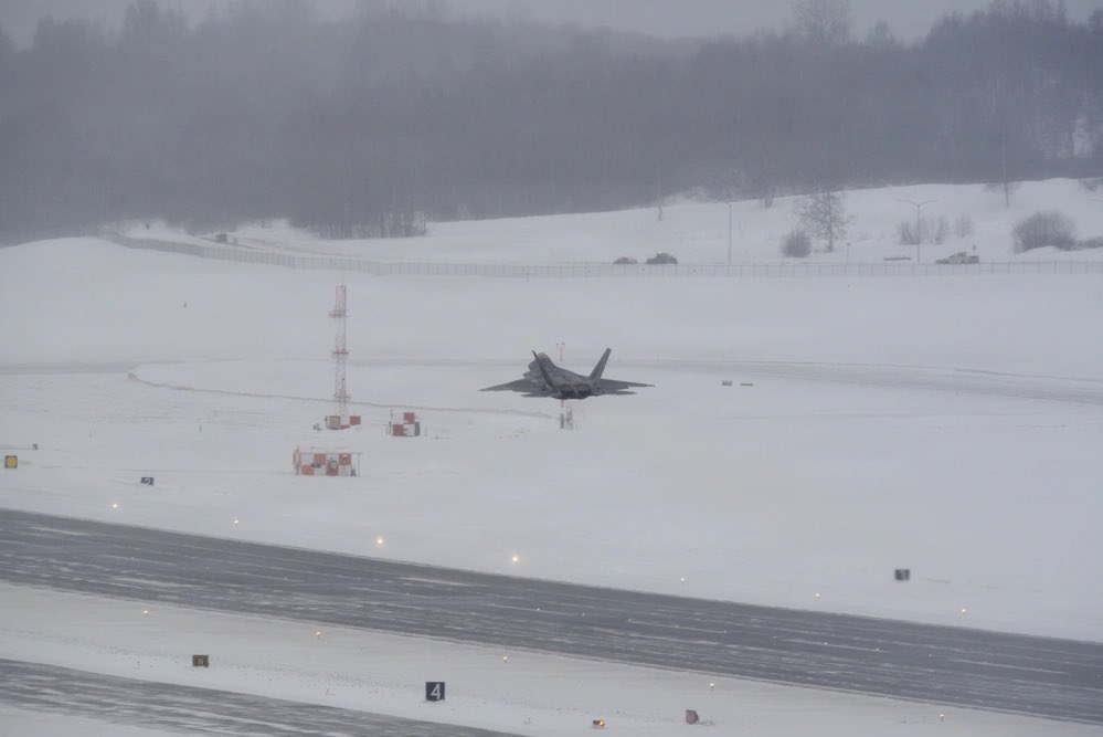 F-22 Raptors assigned to the U.S. Air Force’s 3rd Wing carry out flight operations during snowfall at Joint Base Elmendorf-Richardson in Alaska on February 10, 2026.