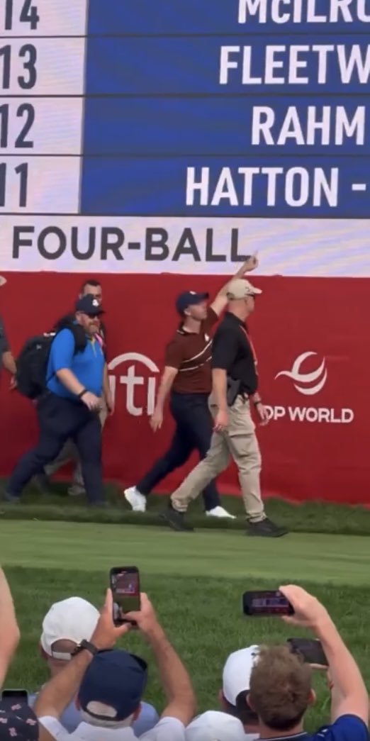 MaxWeir10's tweet photo. Maybe one of the more unnoticed celebrities at @livgolf_league Adelaide today was @McIlroyRory personal Security. Wonder if he’s been given the sack. #LIVGolfAdelaide https://t.co/BUD2PBK7Rl