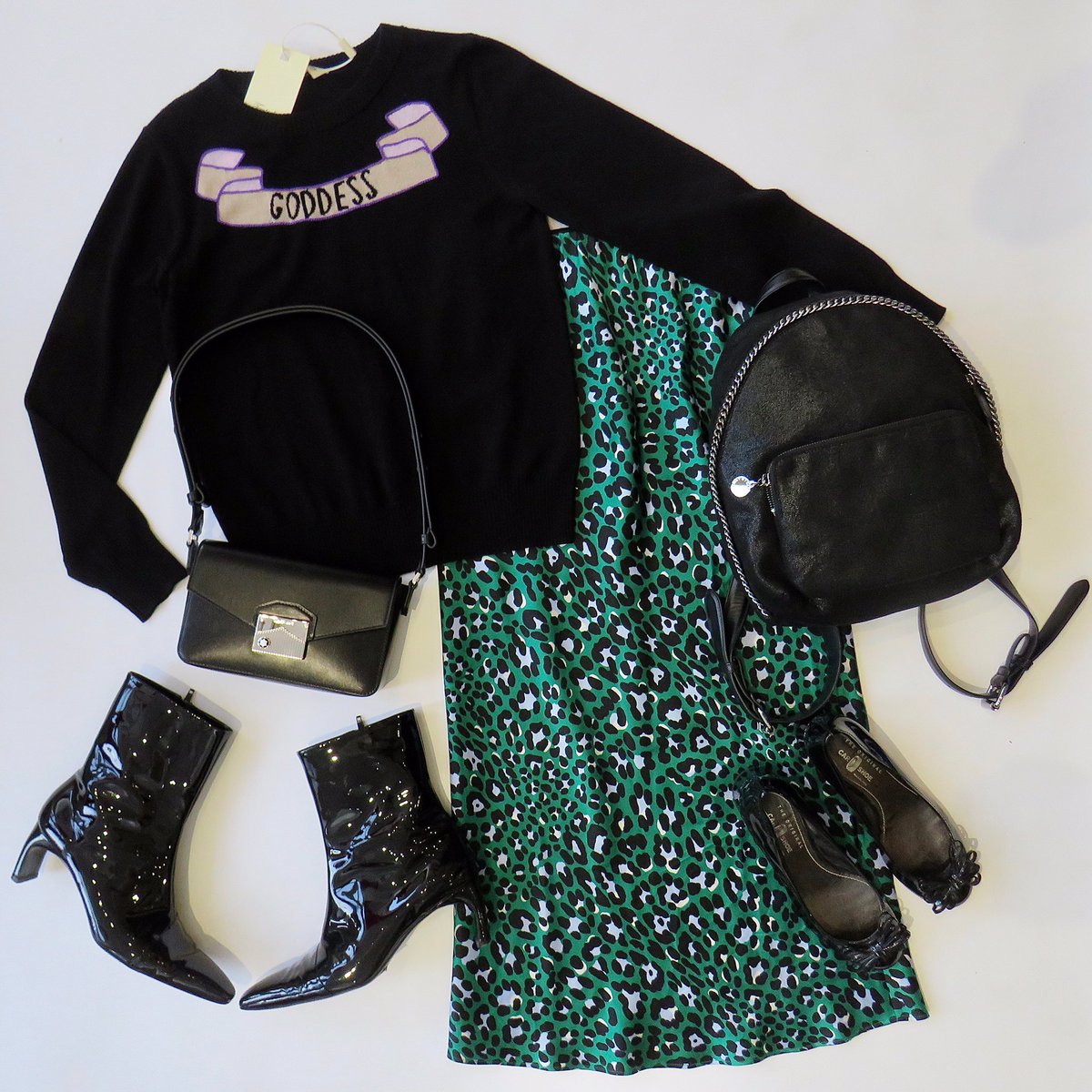 A slogan #Temperley sweater we can get on board with £80, Large 💜 #OlivaVonHalle silk animal print skirt, £70, UK 6 💜 #MontBlanc  shoulder bag, £500 💜 # StellaMcCartney vegan small backpack, £350 💜 #CarShoe  pumps, £80, EUR 37 💜 #RosettaGetty boots, £100, EUR 39 💜 #ootd