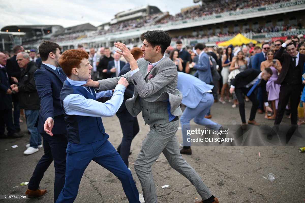 shitbritishpics's tweet photo. Racegoers fight each other as they scuffle on the second day of the Grand National Festival horse race meeting at Aintree Racecourse (2024) https://t.co/TTSTWx8oC4