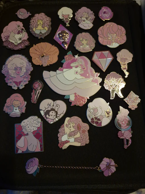 my entire steven universe pin collection. this is one half