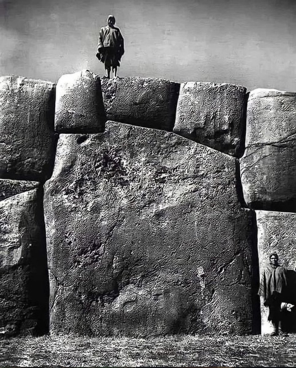 The famous megalithic wall at Sacsayhuamán in Peru

Some individual stones are estimated to weigh over 100–120 tons.

The construction method is unknown