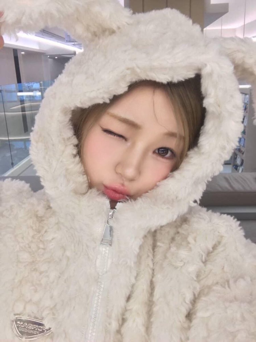 So fluffy! Finally, I’m wearing a jacket with little bunny ears on top. Isn’t it super adorable? This is what you call staying warm and cute at the same time. 🐰🤍✨