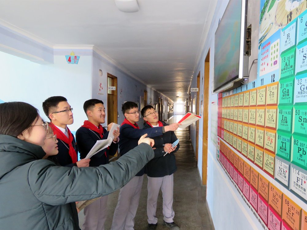 KFAintercomsec's tweet image. Kim Ok Hui, the chemistry teacher at Jungsin Institute, has developed modern teaching methods to improve instruction, such as the interactive periodic table, explaining the data of each element, its current usefulness, and its future technical application.