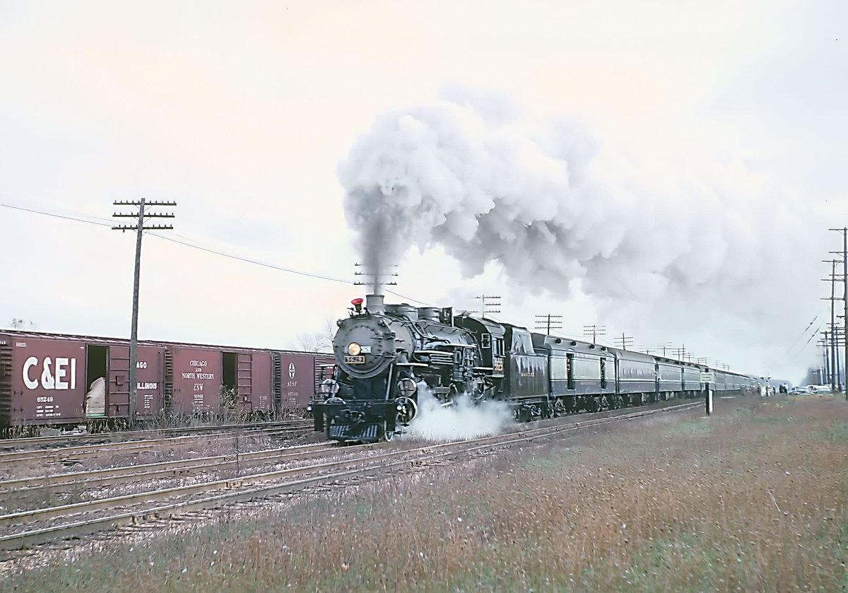 Grand Trunk Western 4-6-2 #5629, lettered as B&amp;OCT #5629, leads a Richard Jensen-sponsored fan trip at 26th Avenue in Bellwood, IL; December, 1961.  Rick Burn 🚂.

american-rails.com/boct.html