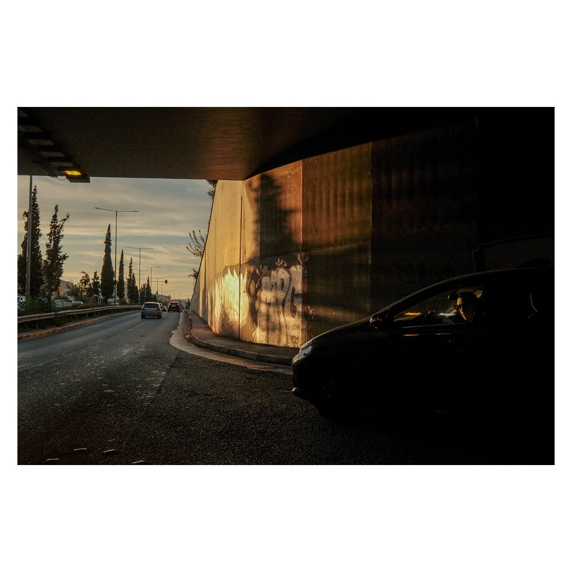 Zisskar's tweet photo. Working the scene. The light was going down fast but the corner was illuminated by the gold sunlight and at the junction the drivers were checking the traffic from the left looking unwantedly towards me. #streetphotography #Athens #fujixseries #fujixt3 https://t.co/YkpSsH6CVN