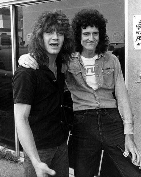 Eddie Van Halen and Brian May share a moment in 1980. Photo by Ron Galella. At the time of this photo Queen had just released "The Game" and Van Halen touring for "Women and Children First,"