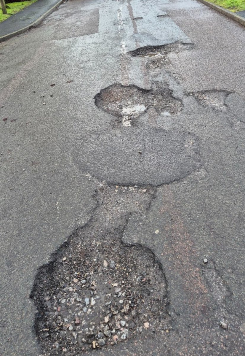 eefnews's tweet photo. 'POTHOLE WATCH' LATEST: Greenhill, Buckhurst Hill.

A resident has told @eefnews Greenhill has 42 "mature and baby" potholes "the biggest is about ten inches deep and the width of nearly half a car".

'Pothole Watch' page link via  https://t.co/fm2PnWDHdx https://t.co/ZulQqYiKxA
