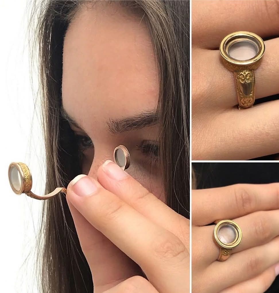 An antique French ring that opens up to reveal a Galilean miniature telescope,1820s.