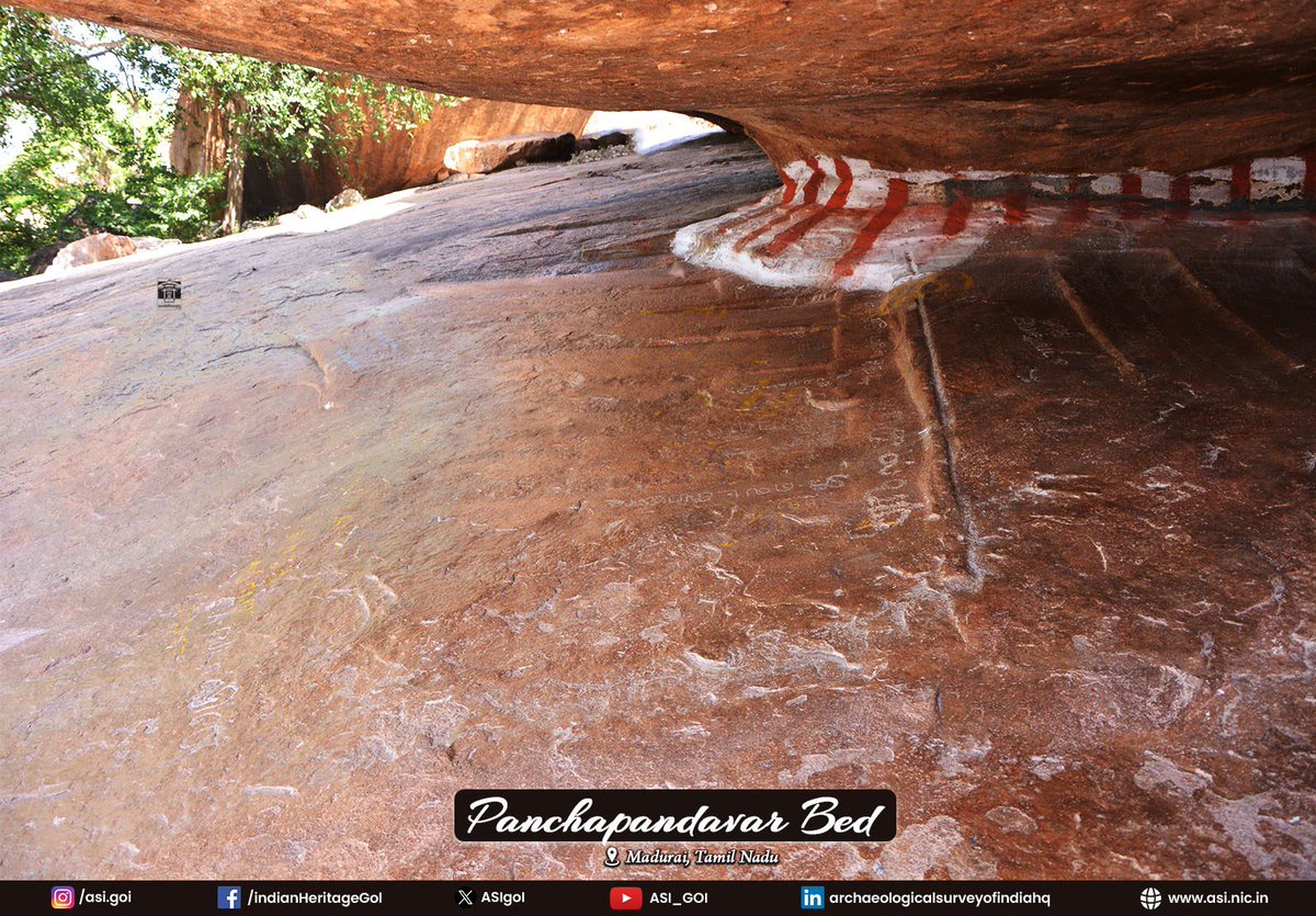 ASIGoI's tweet photo. Panchapandavarmalai, located near Kilaiyur and Kilavalavu, around forty kms. from Madurai district, is an important archaeological site.

A group of boulders spread between the villages preserves numerous remains of stone beds dedicated to Jain ascetics, along with bas-relief sculptures of Jain Tirthankaras and teachers.

The bas-reliefs depict the Tirthankaras either in seated or standing postures. The seated figures are accompanied by the usual chauri-bearers and attendant deities. Some of the images also show traces of paintings. One of the shelters located in the middle portion of the hillock contains 2nd-3rd cen. CE Brahmi label inscription carved below the drip ledge, recording the donation of a stone bed by an individual from Thondi, an early historic port site. In addition, a Vatteluttu inscription dating to the 9th century CE records the carving of the images.