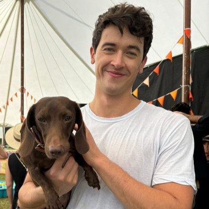 hereismonroe's tweet photo. name something cuter than tom holding dogs in his arms https://t.co/IxwajBRSYU