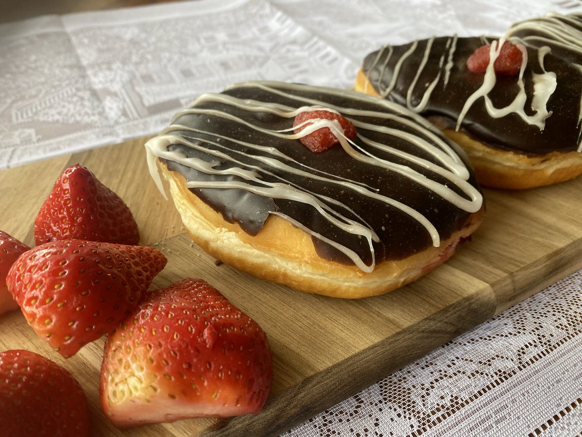 Sweet donuts made with love are perfect for February’s feature donut. These fluffy donuts are stuffed with strawberry filling, then topped with chocolate and finished with drizzled white fondant and topped with a berry. Look no more in the month of l’amour grab some today!