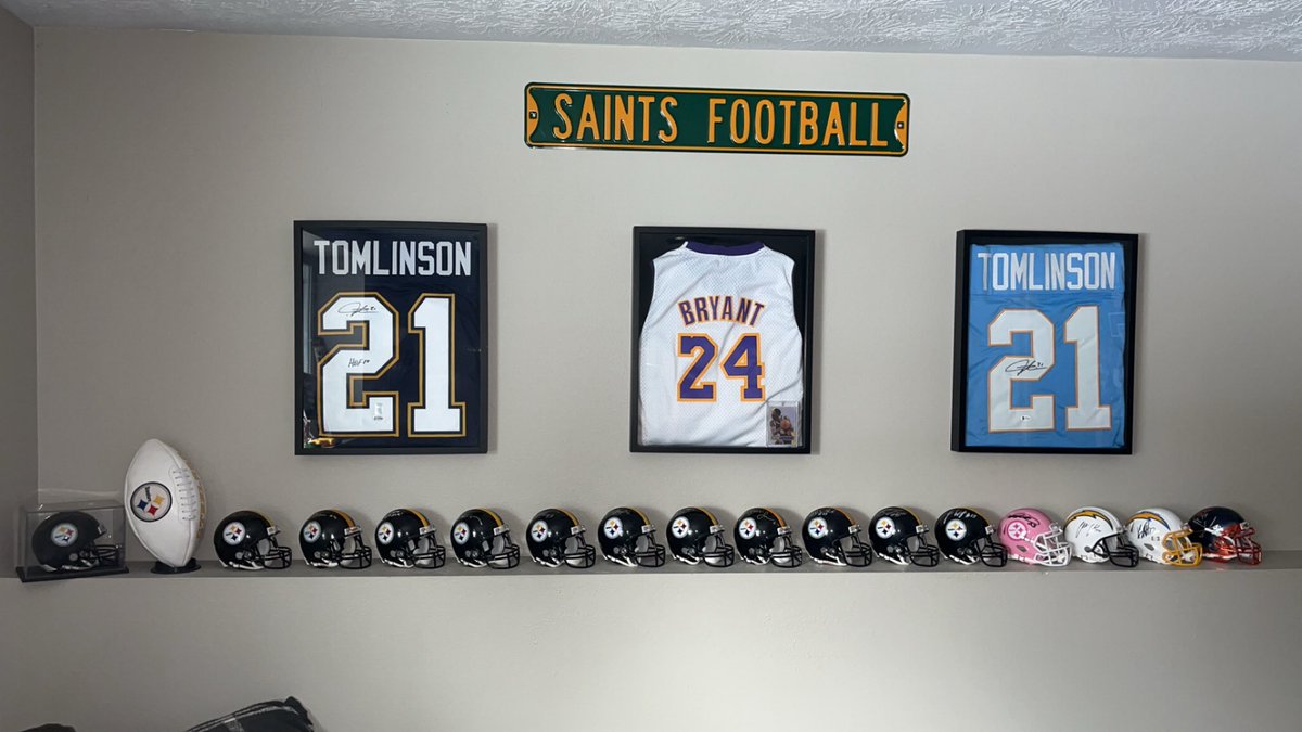 Finally got my jerseys and autographed mini helmets displayed in the house again!