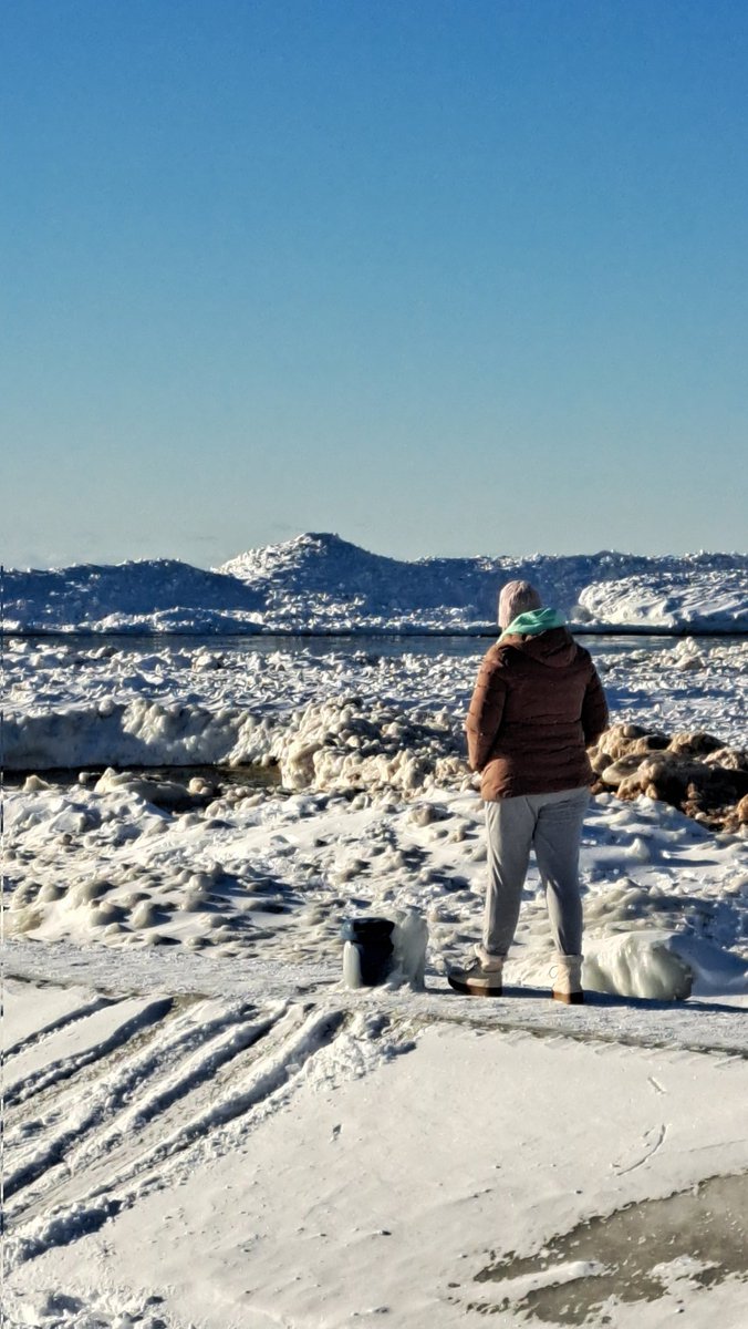The ice at Holland state park really piled during the strong winds with subzero wind chills.