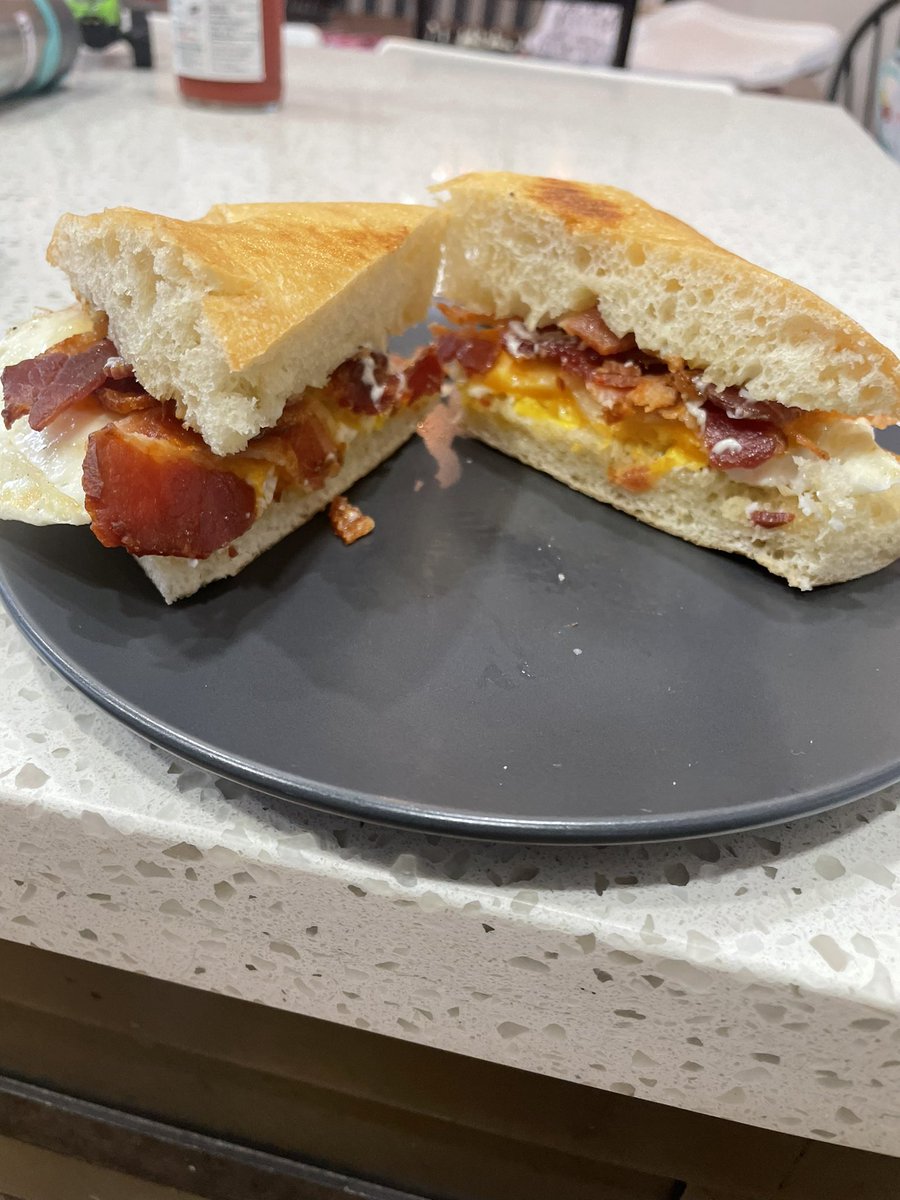 Made a fried egg sandwich with bacon on a ciabatta baguette. Nailed the egg the way I like it nice runny yolk.
