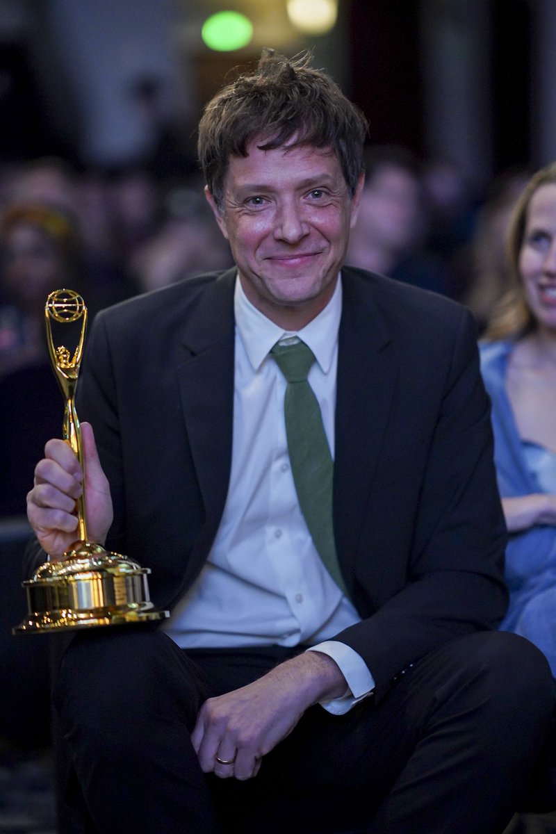 okgo's tweet photo. A delighted Damian collecting one of two Grand Winner Clio awards for our “Love” music video. 

He spoke thusly: “Creativity increasingly seems like something that's supposed to be automated out of us. And our response to that has been basically to double down on doing things the super hard way— pouring as much human effort as we can into each project. The idea is that there will be a human watching it on the other side, and you just want them to feel that human connection.”