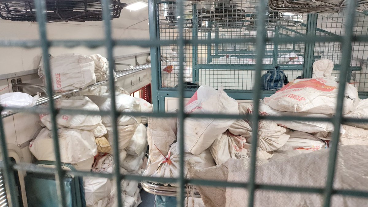 Saliupdates's tweet photo. @RailMadad @RailMinIndia 
Nethravathi Express 16345, A significant portion of the general coach, partitioned off and is completely filled with parcels/luggage. This area is meant for passengers, not cargo. remaining area is packed, posing a safety risk to passengers. https://t.co/C0Flgf1Pq5