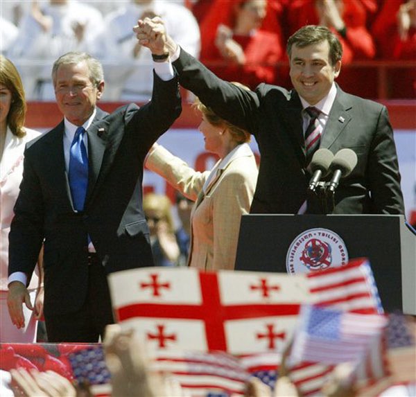 TheBushArchive's tweet photo. in 2008 George W. Bush pushed for Ukraine and Georgia to join NATO.
he said he would not allow Russia to veto its membership bid. "I strongly believe that Ukraine and Georgia should be given MAP [Membership Action Plans], and there are no tradeoffs - period.” 
Europe didn’t support this. French prime minister François Fillon said: "France will not give its green light to the entry of Ukraine and Georgia."
Angela Merkel also opposed this. She even defended her decision in her memoir.